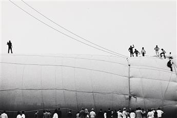 (CHRISTO) An archive with 17 photographs, most documenting Christos 5600 Cubic Meter Package, Kassel, plus 2 by Shunk/Kender.